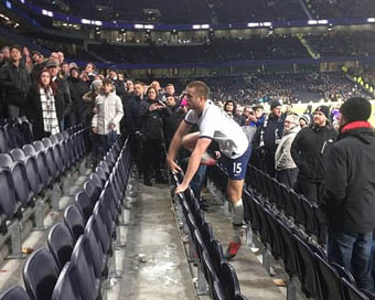  England international Eric Dier jumps into stands