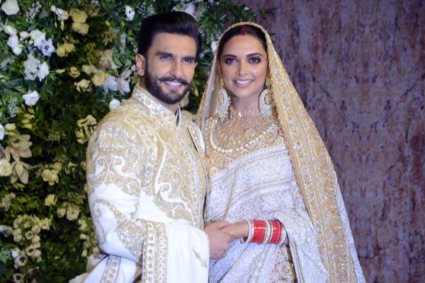 Ranveer, Deepika all smiles at Mumbai wedding reception