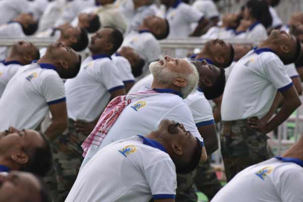 Modi performs yoga with 30,000 people in Ranchi