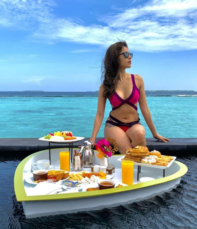 Nushrat Bharucha looks electrifying in hot pink bikini