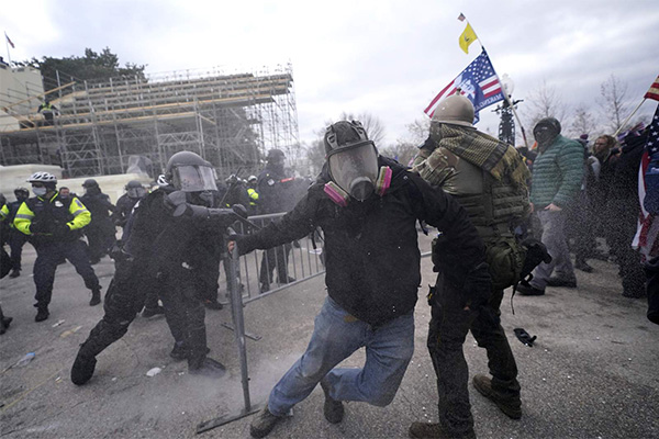 Photos: Chaos in Washington as Trump supporters storm US Senate