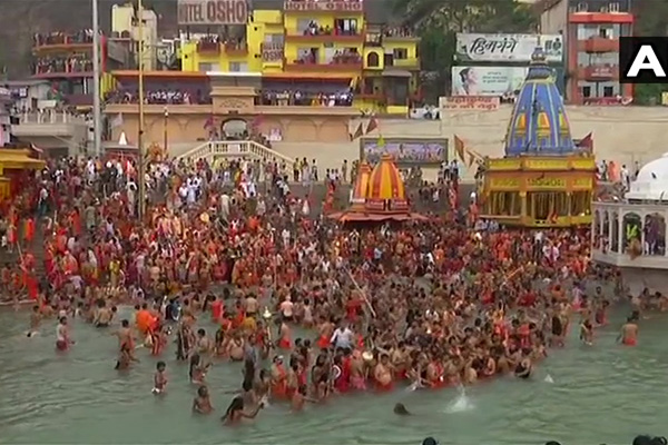 Haridwar Kumbh Mela 2021: Over 2 million pilgrims take holy dip; social distancing goes for a toss (PICS)