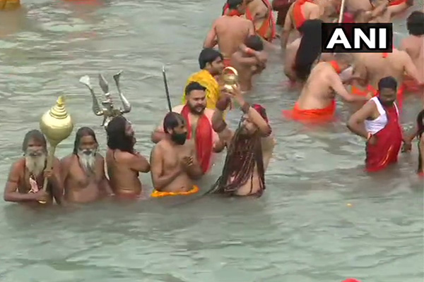 Haridwar Kumbh Mela 2021: Over 2 million pilgrims take holy dip; social distancing goes for a toss (PICS)