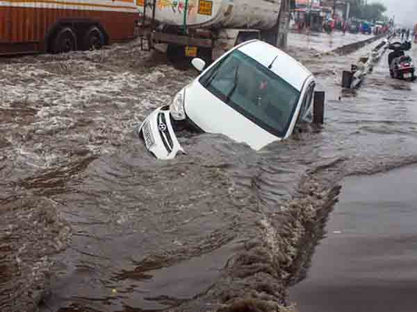 IN PICS | Heavy rainfall lashes Delhi as IMD issues orange alert, waterlogged streets seen across NCR