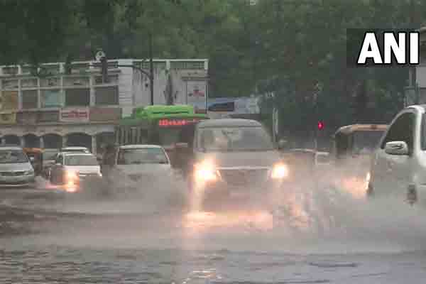 IN PICS | Heavy rainfall lashes Delhi as IMD issues orange alert, waterlogged streets seen across NCR