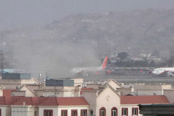 Suicide blasts rock Kabul airport, at least 60 dead (PHOTOS)