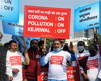 BJP protests against Kejriwal for failing to curb Covid, pollution