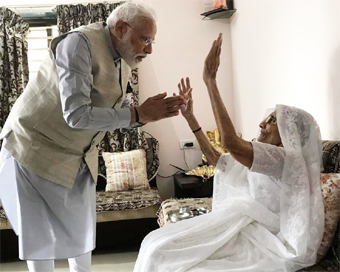 PM Modi meets mother before voting