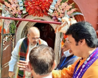 Amit Shah offers puja in Tripura temple, inaugurates silver made door