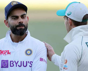 Virat Kohli and Tim Paine after the game