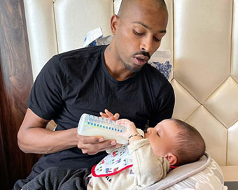 Hardik Pandya feeding milk to his baby