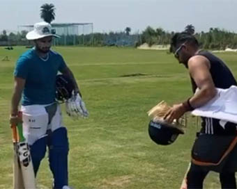 Suresh Raina and Rishabh Pant training together