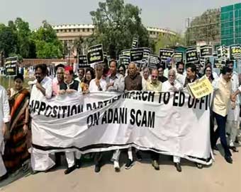 Oppn stage protest march from Parliament to ED office, seek probe in Adani issue