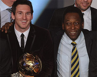 Pele with Messi (file photo)