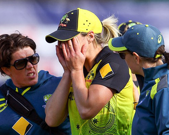  Ellyse Perry walks off the field teary eyed