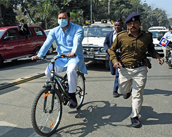After tractor, Tejashwi Yadav cycles to Assembly against fuel price hike