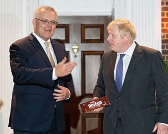 Ashes diplomacy: UK Prime Minister Boris Johnson raises travel concerns with Scott Morrison