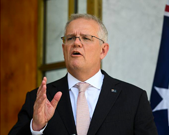 Australia offers visa fee refund to lure international workers and students as PM Scott Morrison defends handling of pandemic
