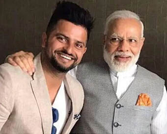 Suresh Raina and PM Modi (file photo)