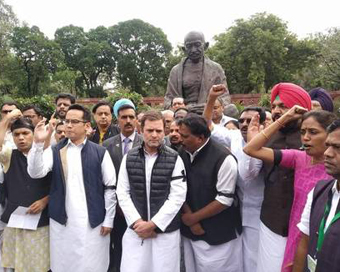 Suspended Cong MPs continue protest outside Parliament