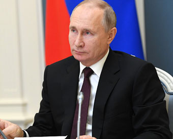 Russian President Vladimir Putin signs law allowing him to run for President again