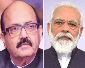 Amar Singh (Left), PM Narendra Modi (Right)