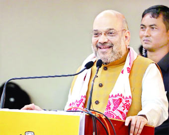 Guwahati: Union Home Minister Amit Shah addresses during the 68th Plenary Session of North Eastern Council at Administrative Staff College, in Guwahati on Sep 8, 2019. (Photo: IANS)