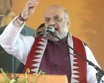 Baramba: BJP chief Amit Shah addresses during a public rally at Baramba in Odisha