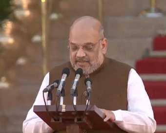 New Delhi: BJP President Amit Shah takes oath as Union Minister at a swearing-in ceremony at Rashtrapati Bhavan in New Delhi on May 30, 2019. (Photo: IANS)