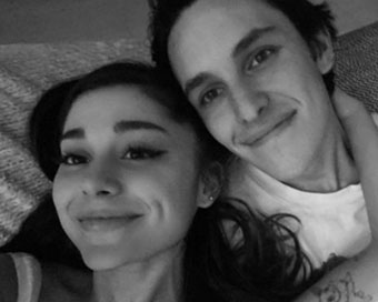 Ariana Grande with fiacne Dalton Gomez