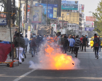 Guwahati: Angry protestants go on rampage while protesting against the Citizenship (Amendment) Bill 2019 that was tabled in the Rajya Sabha today, demanding unconditional withdrawal of the contentious bill, in Guwahati on Dec 11, 2019. The protesters