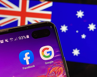 Australia passes landmark law to make Facebook, Google pay for news