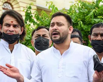 Bihar Opposition leaders arrive at assembly with black face masks