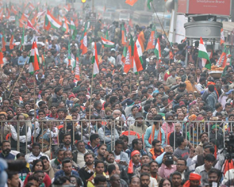 Kolkata: BJP workers participate in a rally organised by the party in support of the Citizenship Amendment Act (CAA) 2019 and National Register of Citizens (NRC), in Kolkata on Dec 23, 2019. (Photo: IANS)