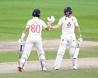 Ollie Pope and Jos Buttler 