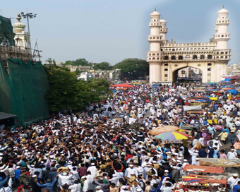 Hyderabad: People gather in large numbers to protest against the Citizenship Amendment Act (CAA) 2019 at Charminar in Hyderabad on Dec 20, 2019. (Photo: IANS)
