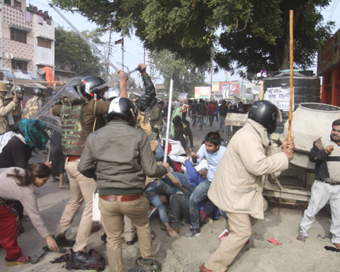 Lucknow: Police baton charges protesters to disperse them during a pdemonstration against the Citizenship Amendment Act (CAA) 2019, in Lucknow on Dec 19, 2019. Violence erupted during protests against CAA on Thursday afternoon in various cities of Ut