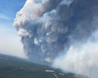 Fast-moving wildfire prompts emergency declaration in Canadian province