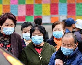 Chinese city to test all residents after local coronavirus cases emerge