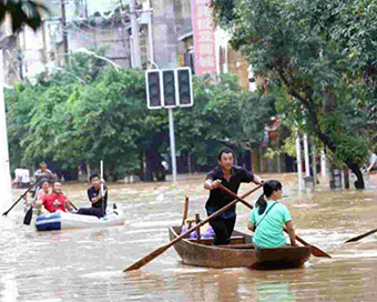 12 killed, thousands evacuated as floods ravage China