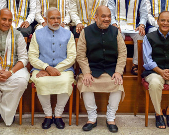 New Delhi: Prime Minister Narendra Modi, BJP president Amit Shah, Home Minster Rajnath Singh and Finance Minister Arun Jaitley during  group photo session before the start of a day-long meeting of the BJP Chief Ministers
