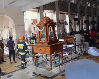 Colombo, April 22, 2019 (Xinhua) -- People work at a blast scene at St. Anthony