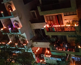 Houses lit up by diyas