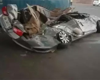 Two crushed to death as truck falls on car 