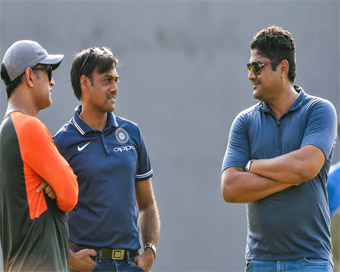 Visakhapatnam: Indian cricketer M.S. Dhoni with national selectors during a training session on the eve of 2nd ODI cricket match against West Indies, in Visakhapatnam.