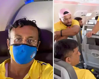 Dhoni swaps business class seat with economy class passenger