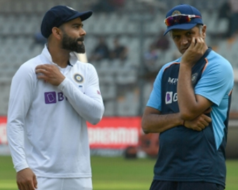 Injured Virat Kohli receives throwdowns from Rahul Dravid