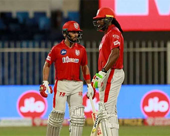 Chris Gayle batting with Mandeep Singh