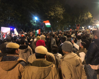 People protest against Jamia firing outside the Delhi Police Headquarters.