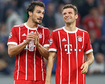 Thomas Mueller and Mats Hummels